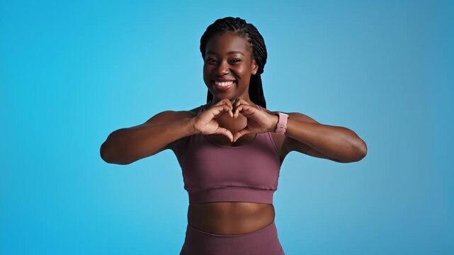 Woman dancing on blue background.