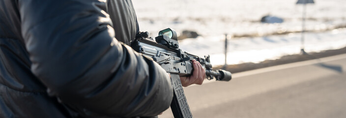 Criminal Attacks Vehicle with Weapon in Hand © Daniel