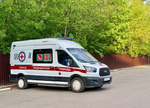 Russia, Moscow region, Krasnogorsk. May 20, 2025. An ambulance parked on the street in summer