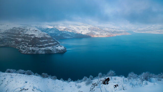 lake and mountains in winter.