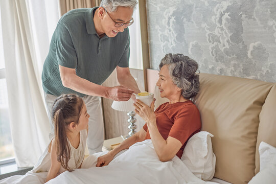 Bedridden elderly patient receiving excellent care