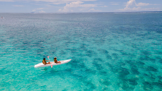 Experience the crystal-clear waters of Flacq, Mauritius while kayaking under the sun