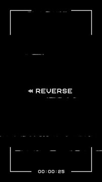 Vertical VHS tape reverse animation with analog distortion, static noise, and glitch interference.