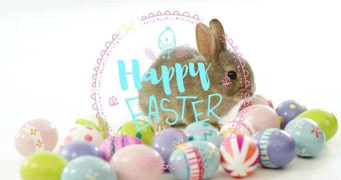 Happy Easter overlay centering over brown rabbit twitching ears among pastel eggs for marketing
