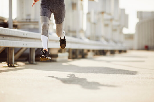 Legs of a woman running