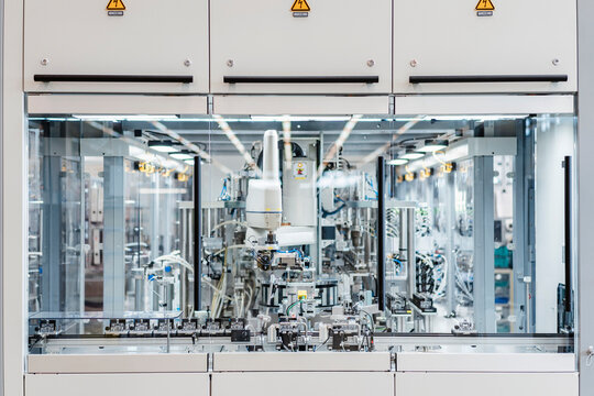 Intricate machinery inside modern factory, Stuttgart, Germany