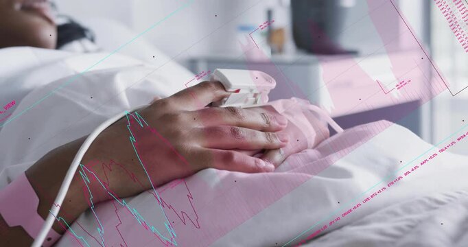 Woman lying reaching placing oximeter on left finger securing relaxing monitoring vitals via graphs