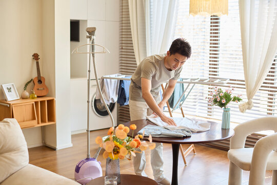 A stay-at-home dad busy with the household chores