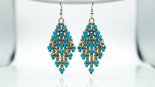 Beautiful Handcrafted Jewelry Showcase. Closeup Of Turquoise Chandelier Earrings Design. Showcasing Intricate Turquoise Bead Chandelier Earrings With Metallic Accents Against Neutral Background