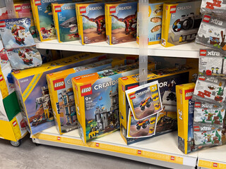 Naklejka premium Lego creator sets on store shelf