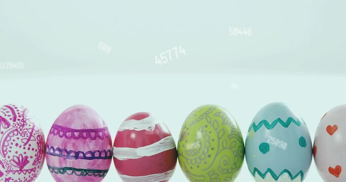 Floating numerals appearing, row of decorated eggs rising, wobbling, settling to showcase patterns