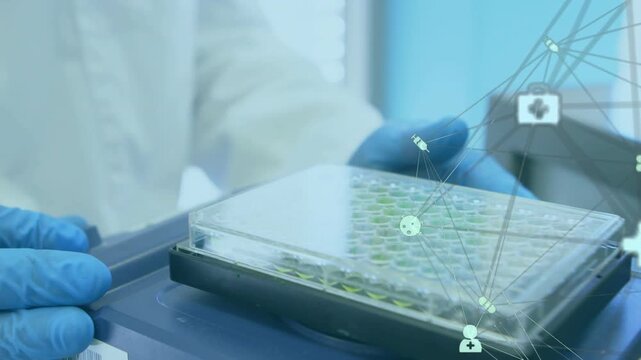Tech steadying tray, gloved hand lifting and aligning 96-well plate lid, med icons overlaying plate