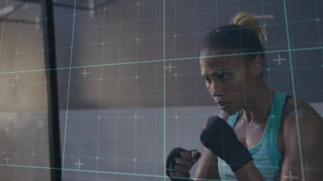 Woman from guard throwing rapid punch combos for fitness, grid tracking metrics, holding guard
