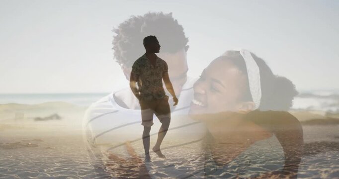 Man walking beach, pausing aligning with transparent couple overlay, evoking memory for marketing