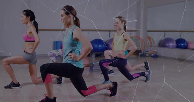 Five women on instructor cue performing synchronized lunges in gym, polygon overlays showing form