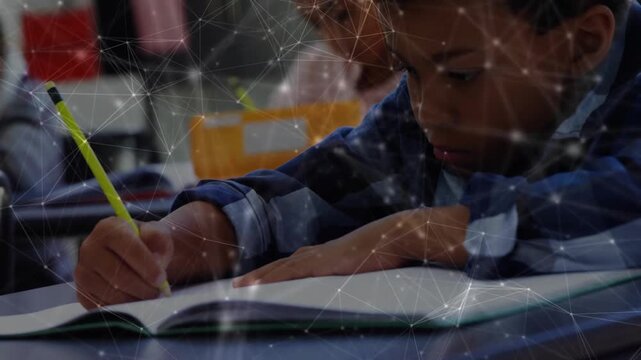 Camera starting closeup, child writing with yellow pencil, adjusting grip and leaning to read