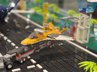 Naklejka premium Lego jet on runway with control tower