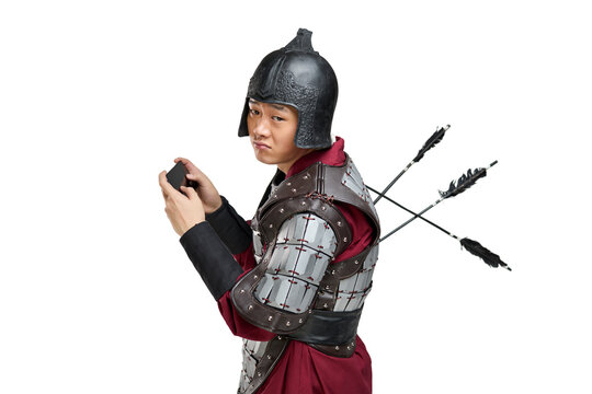 Humorous studio shot: armored ancient soldier