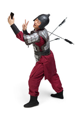 Humorous studio shot: armored ancient soldier