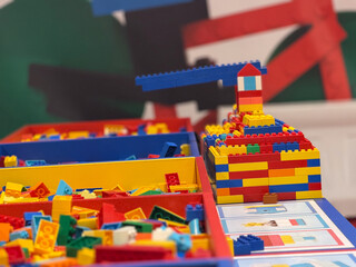 Naklejka premium Colorful lego bricks and built structure