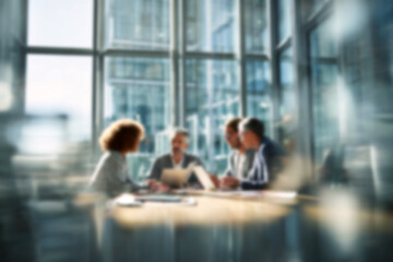 Fototapeta premium Blurred Professional team collaborating in modern office meeting