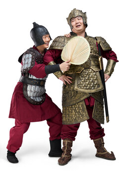 Humorous studio shot: armored ancient general and soldier