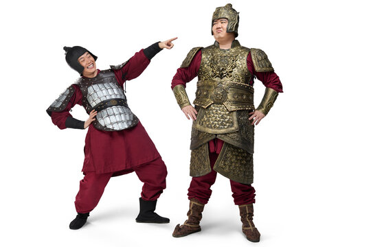 Humorous studio shot: armored ancient general and soldier
