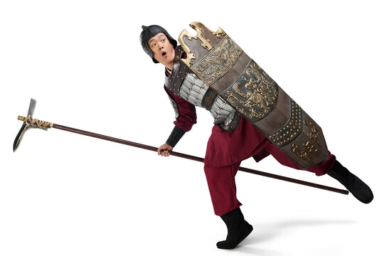 Humorous studio shot: armored ancient soldier