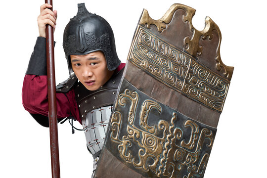 Humorous studio shot: armored ancient soldier