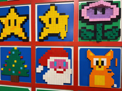 Colorful lego pixel-art mosaics in framed grid