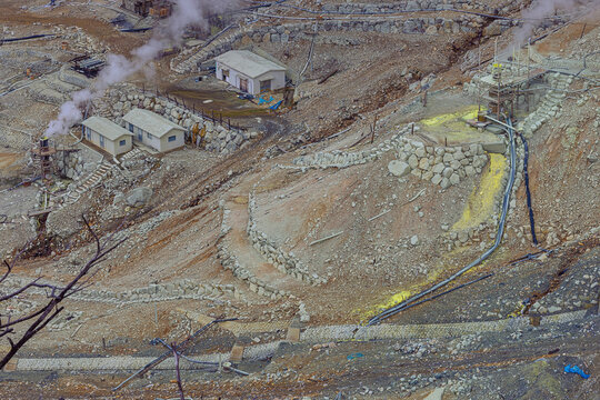 Close up of the sulphur extraction site at Owakudani, a place with intense volcanic activity