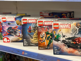 Naklejka premium Lego marvel building sets on retail shelf