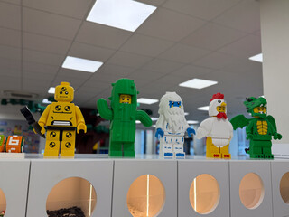 Naklejka premium Lego minifigure mascots on display