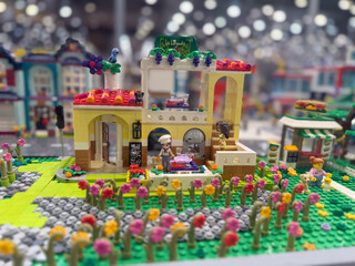 Naklejka premium Lego cafe with flower garden