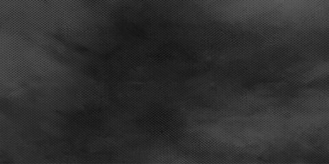 Fototapeta premium A vintage dark grunge backdrop featuring textured black and white smoke swirling across an aged gray chalkboard surface for an empty blank wallpaper design