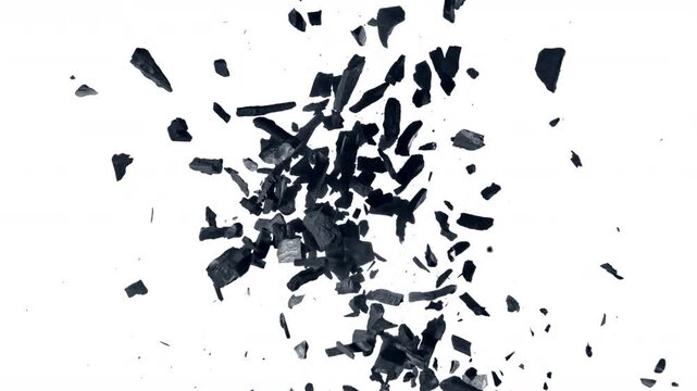Super Slow Motion Flying and Colliding Charcoal Isolated On White Background at 1000 fps.