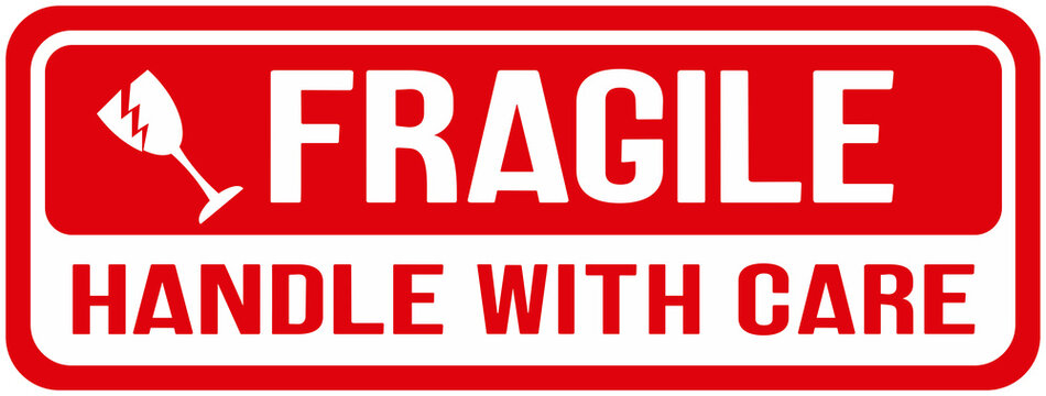 Sticker in red color that says : fragile handle with care