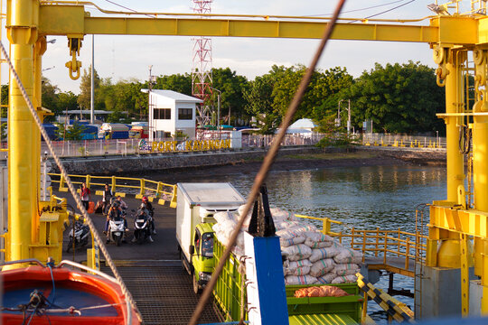 Ferry boarding vehicles at Kayangan Port, Lombok heading to Poto Tano, Sumbawa