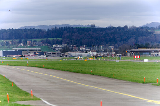Patrouille Suisse Northrop F-5E Tiger II fighter jets landing at Emmen AIr Base on a cloudy late winter day. Photo taken March 16th, 2026, Emmen, Switzerland.