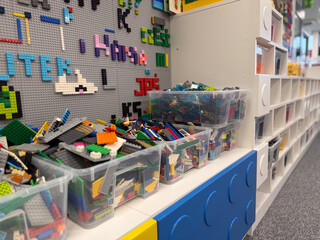 Obraz premium Organized lego bins and baseplate wall