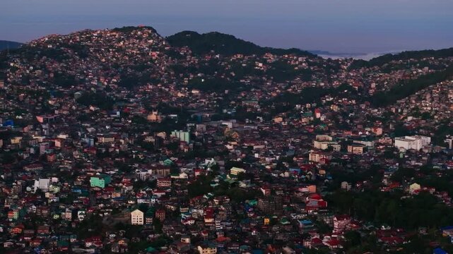 Evening light above hillside homes Baguio East Benguet Philippines cityscape