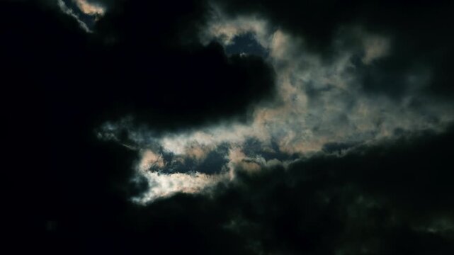 4K 59,94fps Cinematic Sky: Dazzling Light Burst Through Dark Moving Clouds