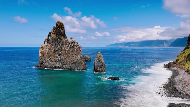 Ribeira da Janela volcanic rocks in Atlantic Ocean, Madeira Portugal. Steep coastal cliffs and natural sea stacks along island shoreline