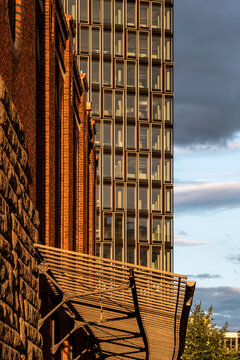 Urban Berlin Germany architecture detail with modern brick building facade and rich texture creating contrast through angled light and deep lines
