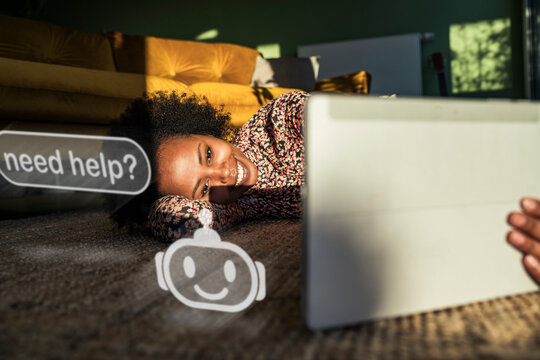 Woman relaxing at home using tablet with AI chatbot digital help