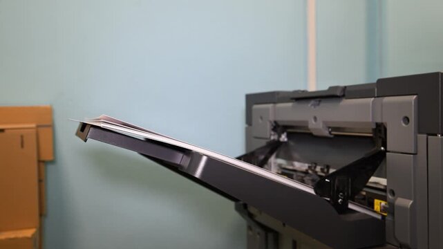 The process of printing printed products in the production shop of the printing house. Industrial paper printing
