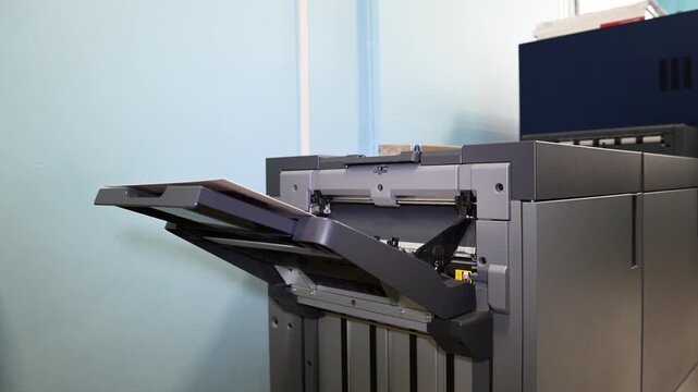 The process of printing printed products in the production shop of the printing house. Industrial paper printing