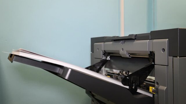 The process of printing printed products in the production shop of the printing house. Industrial paper printing