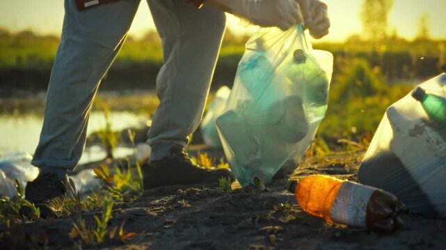 An eco-conscious activist diligently collects sorts plastic bottles refuse fading light, demonstrating commitment to environmental protection sustainable recycling practices to mitigate climate change
