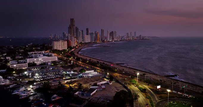 Twilight drone view in Cartagena of Bocagrande with modern skyscraper skyline